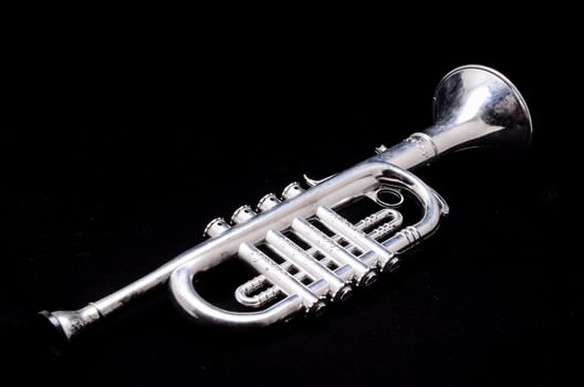 Trumpet on black background photo