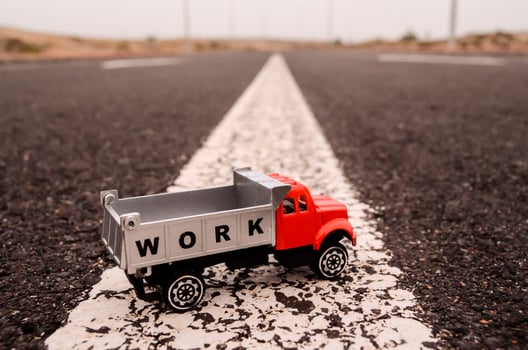 Toy truck on the road photo