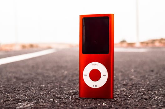 Red iPod on the road photo
