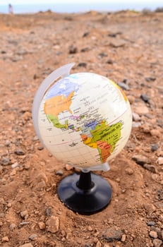 Globe on the ground photo