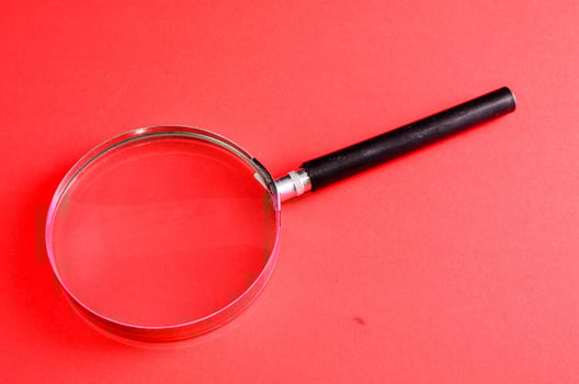 Isolated magnifying glass photo