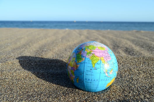 Globe on the beach photo