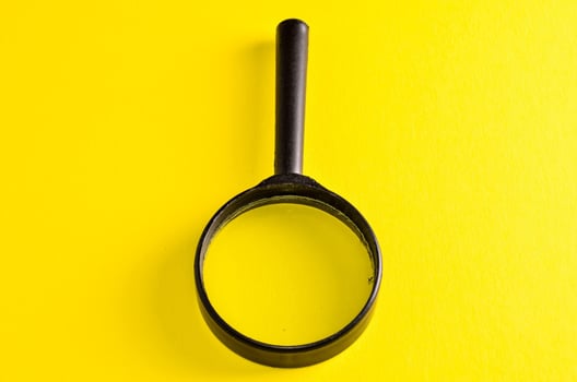 Isolated magnifying glass photo