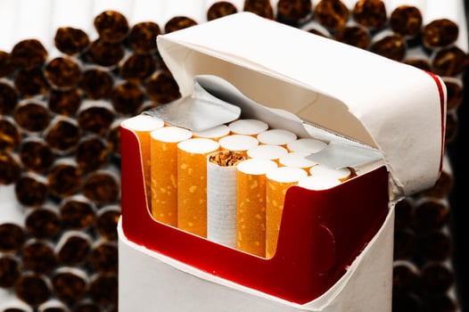 Tobacco industry concept with cigarettes photo