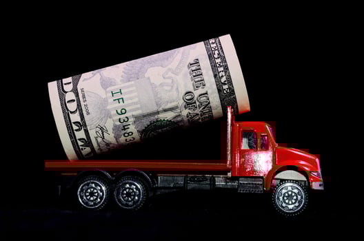 Toy truck carrying cash photo