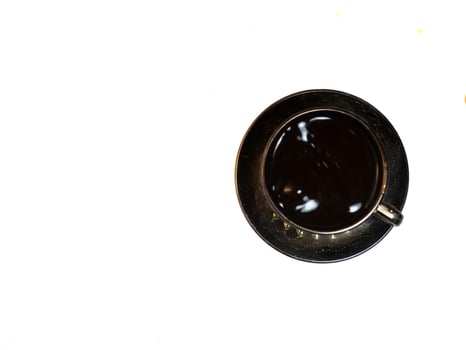 A cup of black coffee on the table. photo