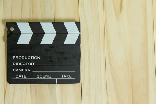 movie slate on wood for movie content. photo