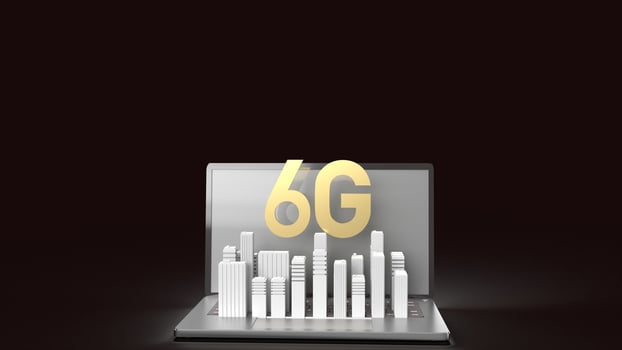 The 3d rendering 6g text gold surface glow on notebook and building  in dark image for mobile technology content. photo