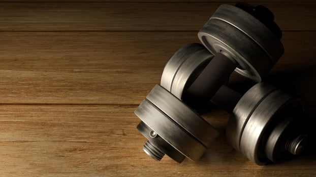 dumbbells  wood floor dark tone 3d rendering for fitnesses content. photo