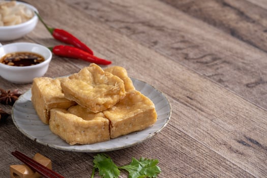 Deep fried stinky tofu with pickled cabbage street food in Taiwan. photo