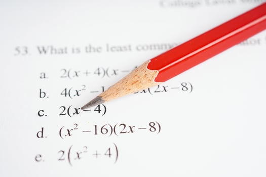 Pencil on mathematic formula exercise test paper in education school. photo