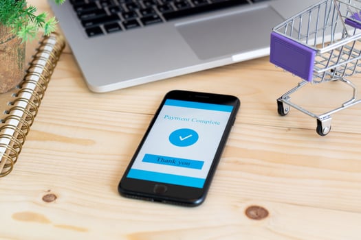 smartphone and laptop computer for online shopping at home photo