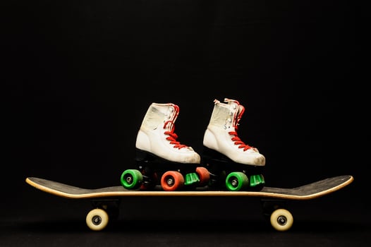 Skateboard on black background photo