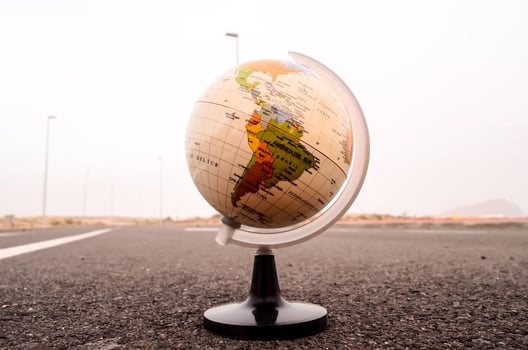 Globe on the road photo