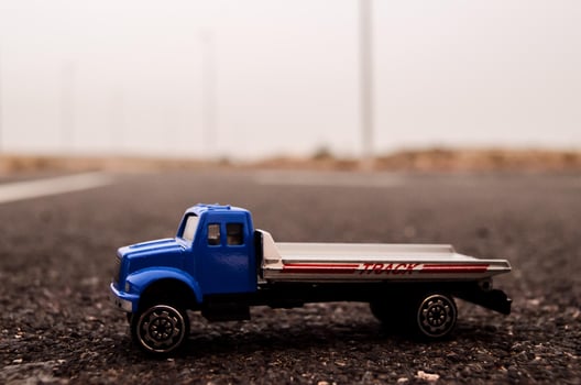 Miniature truck on the road photo