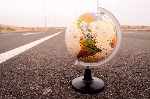Globe on the road photo