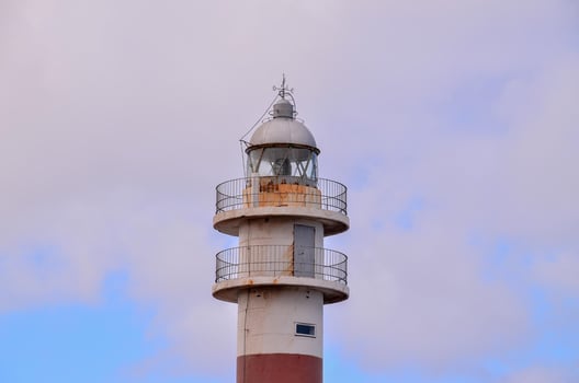 Lighthouse by the sea photo
