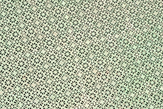 Green metal structure with patterns photo