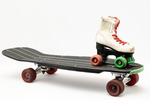 Rollerskates on skateboard photo