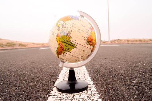 Mini globe on the ground photo