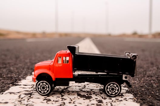 Truck miniature on the road photo