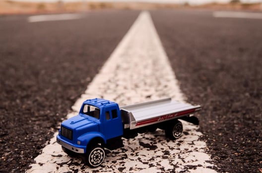 Truck miniature on the road photo