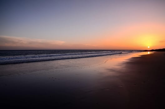 Sunset by the beach photo
