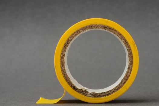 Yellow roll of tape photo