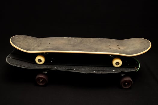 Skateboard on black background photo