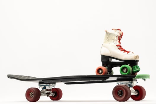 Skateboard and roller skate photo