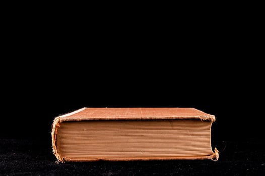 Book on dark background photo