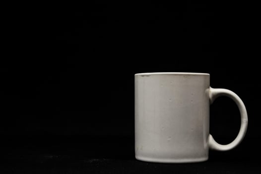 Mug on dark background photo