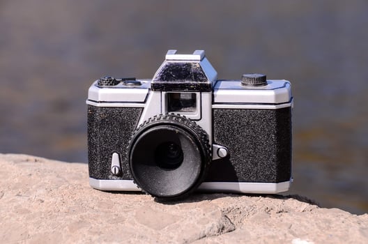 Camera on the rock photo