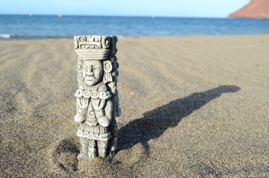Statue in the sand photo