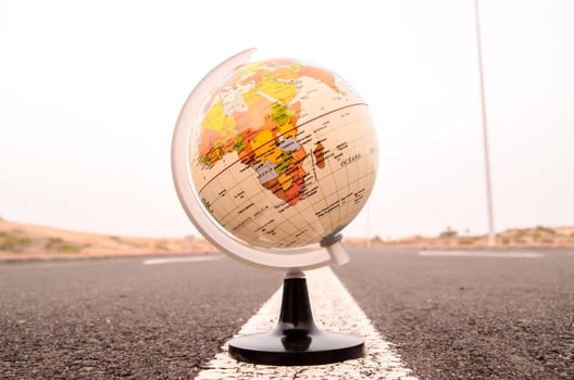 Globe on the road photo
