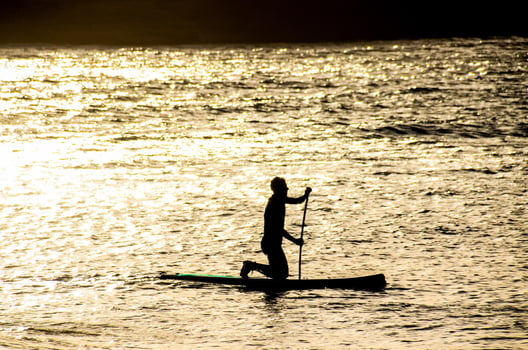 Silhouette of a surfer photo