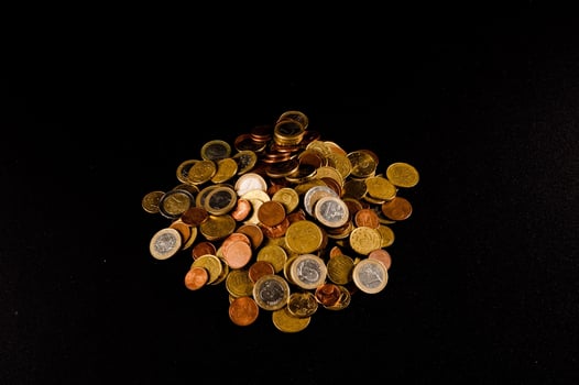 Coins on black background photo