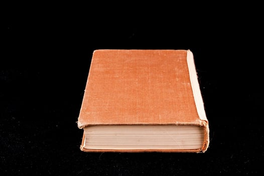 Book on dark background photo
