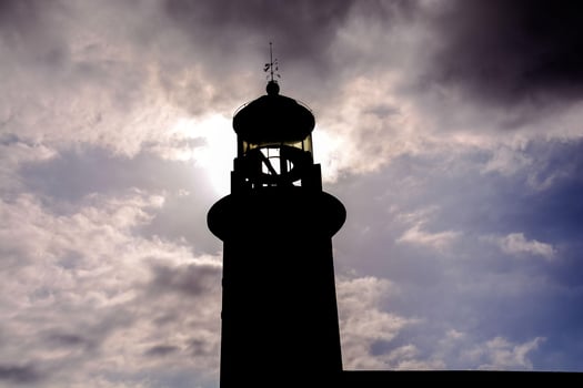 Lighthouse by the sea photo