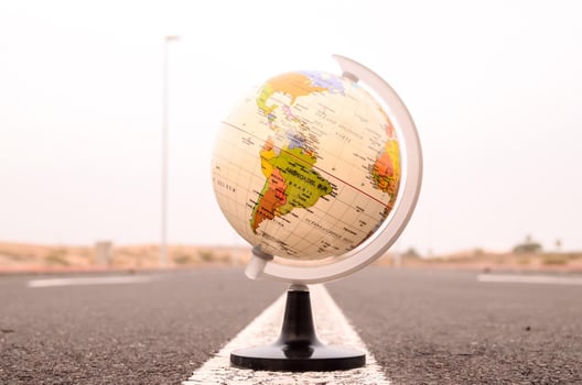 Globe on the road photo