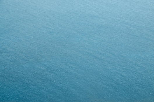 an aerial view of the ocean from above photo