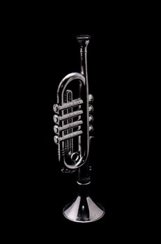 A trumpet on black background photo