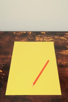 Paper and pencil on the table photo