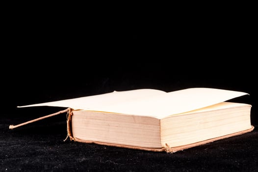 Isolated book on black background photo