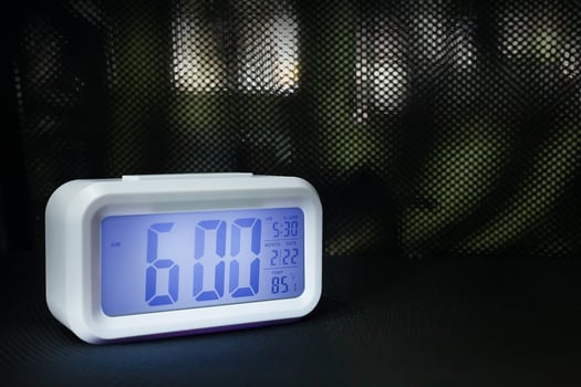 Digital alarm clock  6am close up image. photo