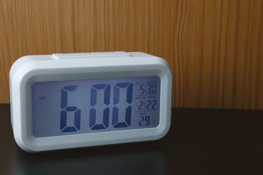 Digital alarm clock  6am close up image. photo