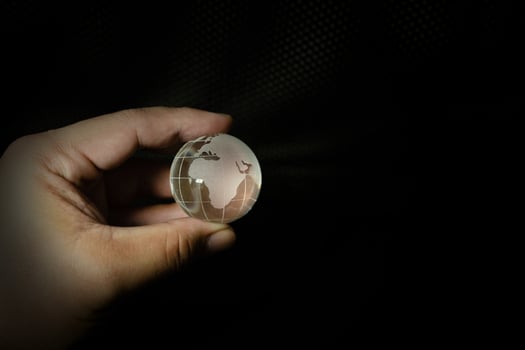 The glass ball planet earth and hand image. photo