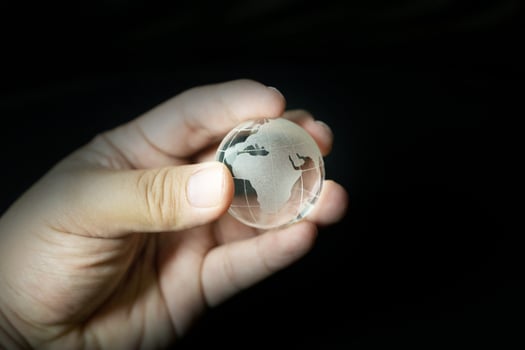 The glass ball planet earth and hand image. photo