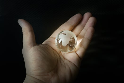 The glass ball planet earth and hand image. photo