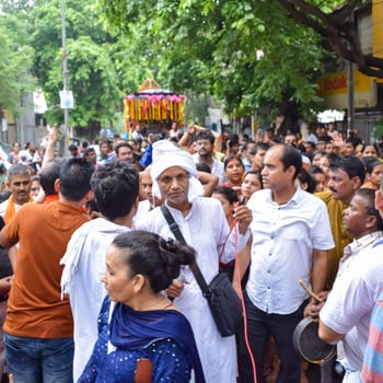 New Delhi, India July 01 2022 - A huge gathering of devotees from different parts of Delhi on the occasion of ratha yatra or rathyatra. Rath for Lord Jagannath pulled by people, Jagannath Rath Yatra photo